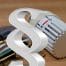 Heizkörperthermostat mit Paragraphenzeichen und Bezug zu Heizkostenverordnung und Gebäudeenergiegesetz